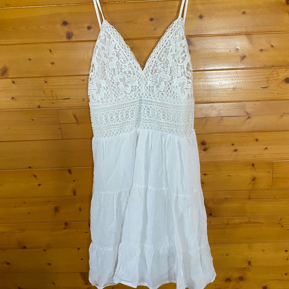 Cute short white dress. Never worn.
